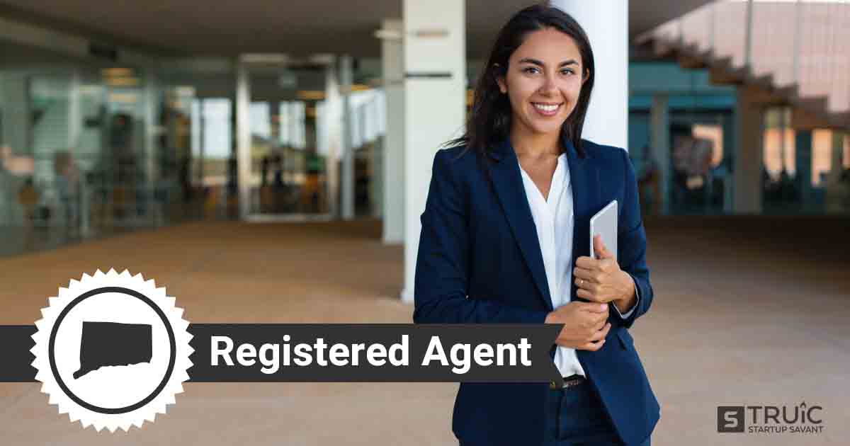 A smiling Connecticut registered agent