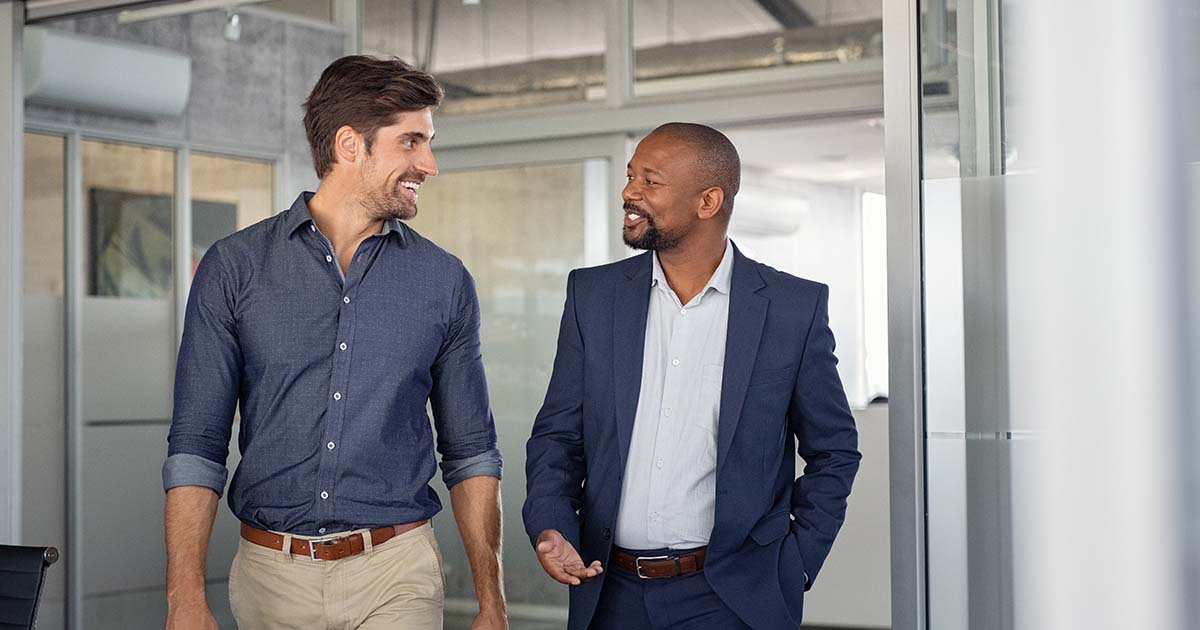 https://startupsavant.comTwo businessmen talking to each other.
