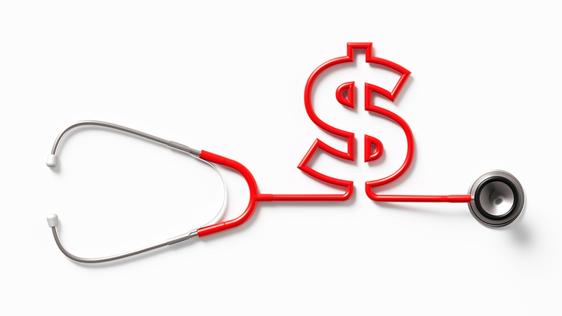 Red Stethoscope Forming An American Dollar Sign On White Background.