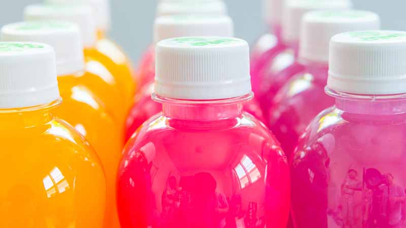 Colorful juices in bottles.
