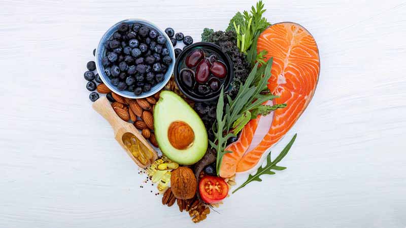 Healthy foods arranged in a heart shape.