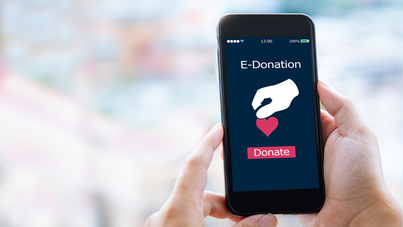 Phone showing an "E-Donation" screen.
