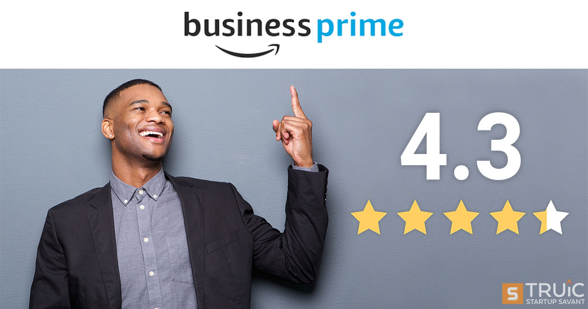 Smiling business person pointing at 4.3 stars and Amazon Business Prime American Express card.