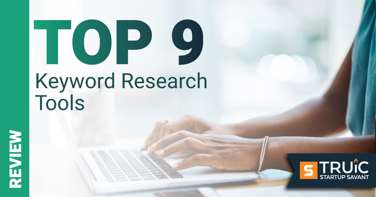 https://startupsavant.comWoman typing and looking at the top keyword research tools.