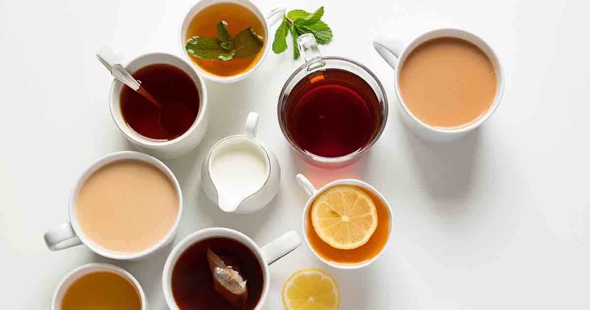 A variety of teas on white cups.